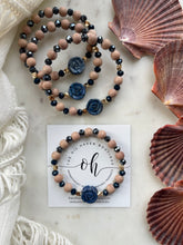 Load image into Gallery viewer, Lapis Lazuli Carved Rose
